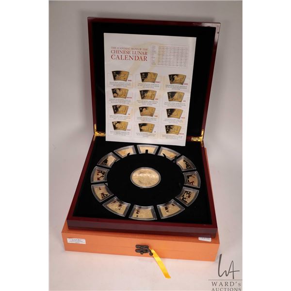 Boxed Chinese 24kt gold plated lunar medallions