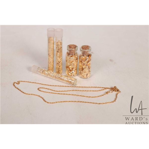 Five vials of what appears to be gold flake, untested, unweighed