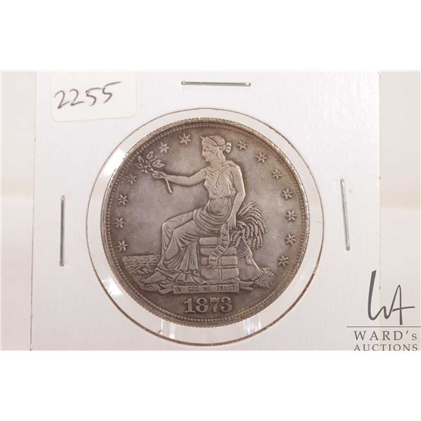 Believed to be a replica 1873 USA trade dollar