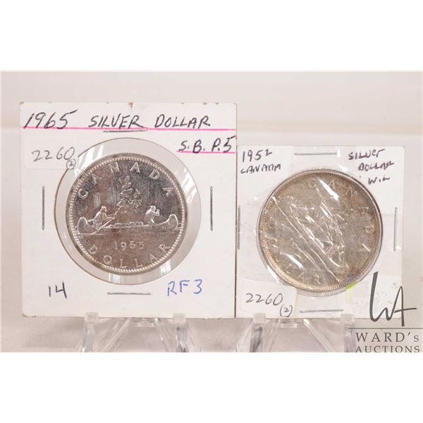 Two Canadian silver dollars including 1952 and 1965