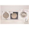 Image 1 : Three Canadian silver dollars including 1952, 1960 and 1965