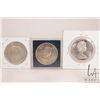 Image 2 : Three Canadian silver dollars including 1952, 1960 and 1965