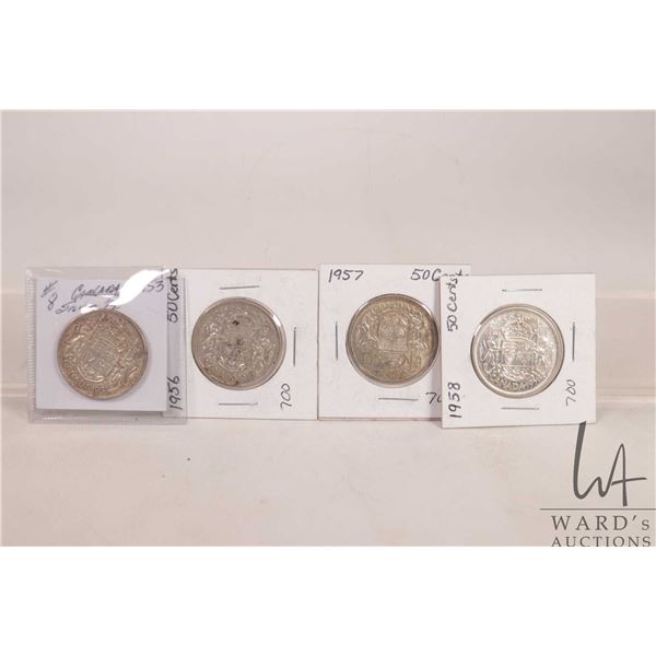 Four Canadian fifty cent coins including 1953, 1956, 1957 and 1958