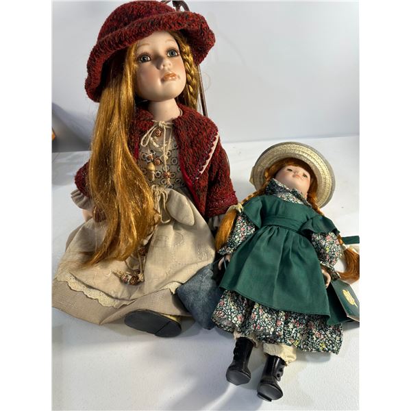 Pair of Porcelain Dolls with Red & Green Outfits