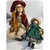 Image 1 : Pair of Porcelain Dolls with Red & Green Outfits