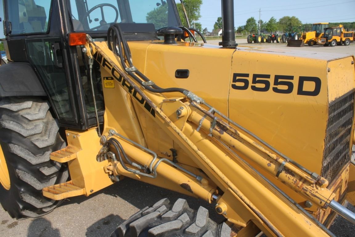 Ford 555D 4wd backhoe, cab, 2472 hours, made in USA