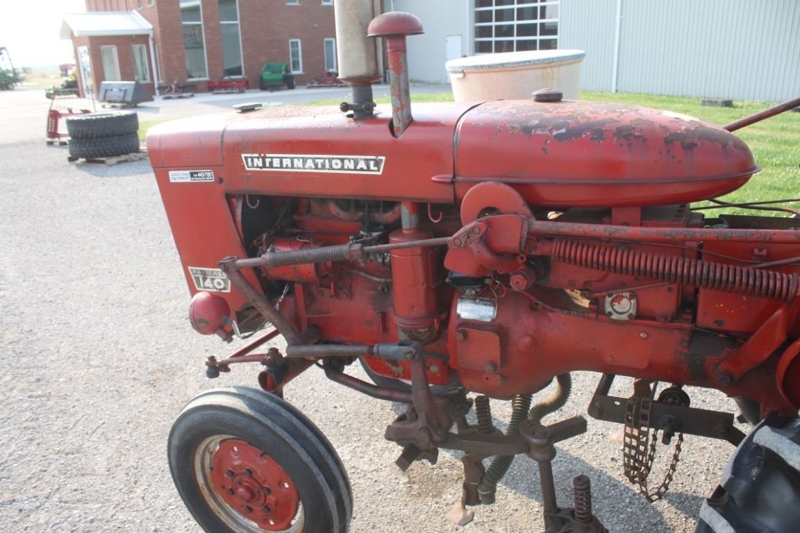 IH 140 2wd tractor, mounted cultivator, side dresser