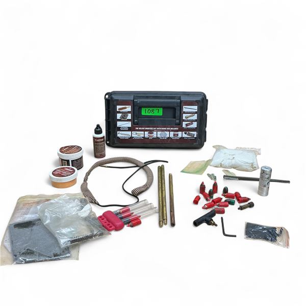 Assorted Firearm Cleaning Supplies and Plastic Range Box