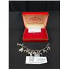 Image 1 : Sterling Charm Bracelet + 11 Sterling Charms - 37.76 gr (Red Box)