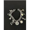 Image 3 : Sterling Charm Bracelet and 12 Charms 36.5 gr Including Yukon Gold Pan w/ Nuggets (Untested) Green B