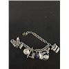 Image 2 : Sterling Charm Bracelet w/ 11 Charms (26.6 gr) + 9 Extra Sterling Charms (Blue Box)