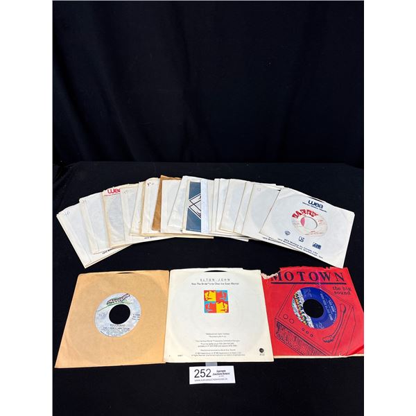 Lot of 25 45 Records in Sleeve 4 Tops, Elton John, Ronny and the Daytonas, etc