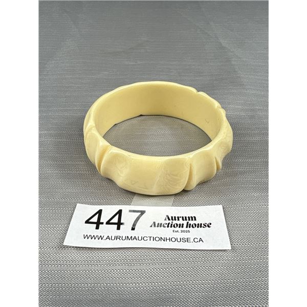 Vintage Carved Bakelite or Celluloid Bangle