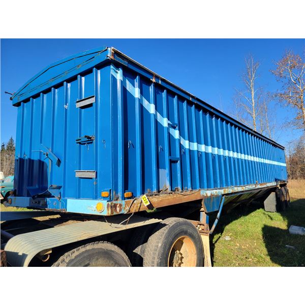 Approx. 38 ft. Fruehauf grain trailer, 3 hoppers, roll-tarp, 11R22.5 rubber, need repairs, no visibl