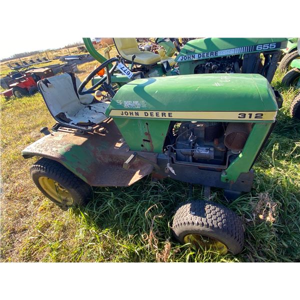 J.D. 312 Riding Tractor. No Deck, otherwise looks complete