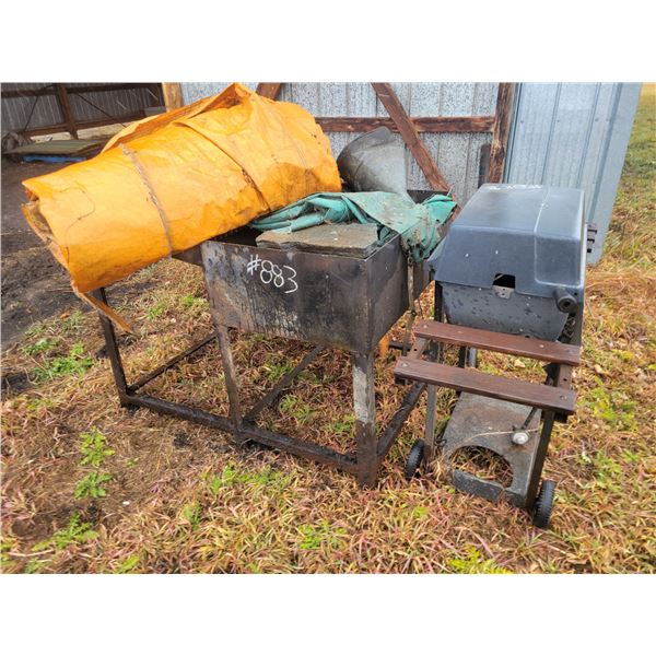 Misc. tarps, steel work bench, landscape rocks & barbeque