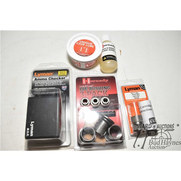Loading accessories including Hornady Lock-N-Load die bushings, Hornady case lube, Hornady sizing lu