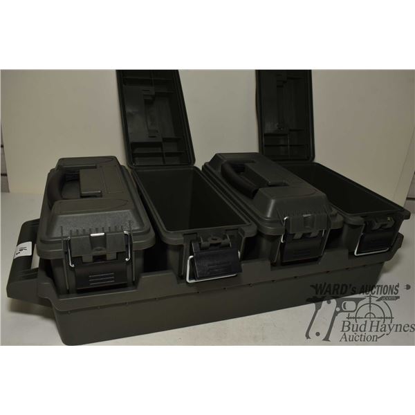 Four plastic ammo boxes in tray, a large 16" x 16" x 8" carry case w/ rifle holders and small ammo c