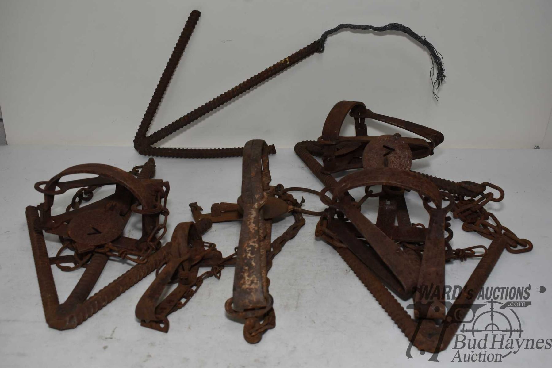 Spring Trap Machine Three Onieida-Victor #3 long spring traps w/ chains and anchors, one ...
