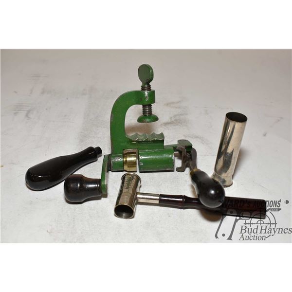 Selection of vintage loading tools including 12 gauge crimp tool, Bridgeport #21 powder measure, Eur