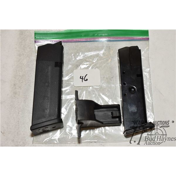 Two pistol mags including Beretta 92 9mm w/ loader and a .45 cal Glock