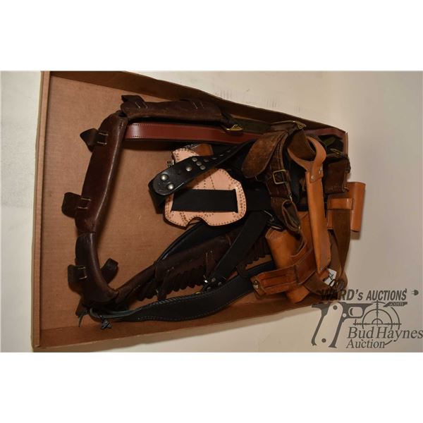 Selection of leather goods including belt holster, ammo pouches, ammo belt, gun sling and knife shea