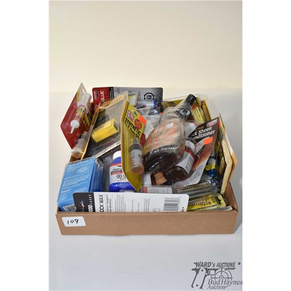 Tray lot of new in package cleaning supplies including oils, grease, assorted barrel caliber brushes