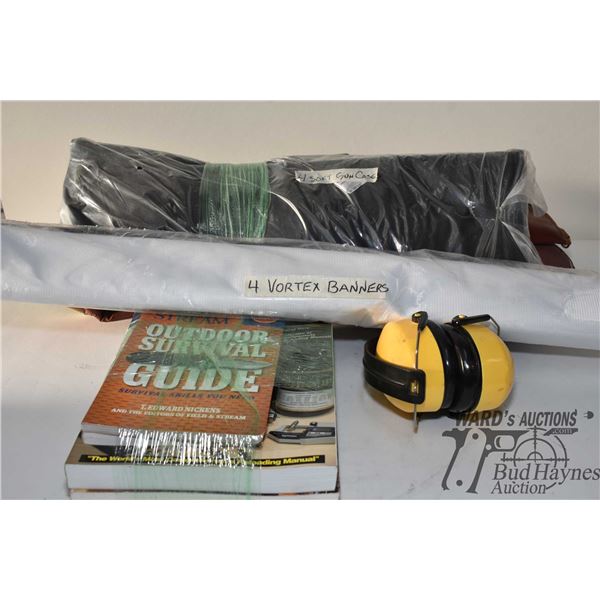 Box containing 2 Lyman reloading manuals, 2 outdoor books, a pair of ear muffs and 4 soft cases and 