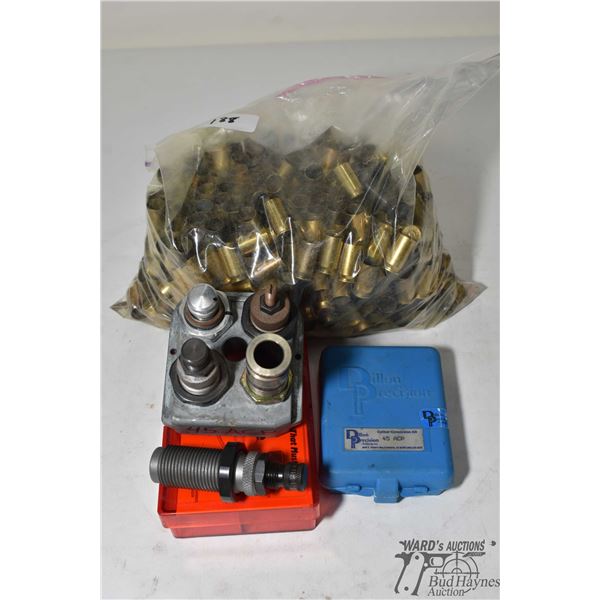 Lee .45 ACP die set in Dillon tool block, caliber conversion kit and a 6 lb bag of .45 ACP brass