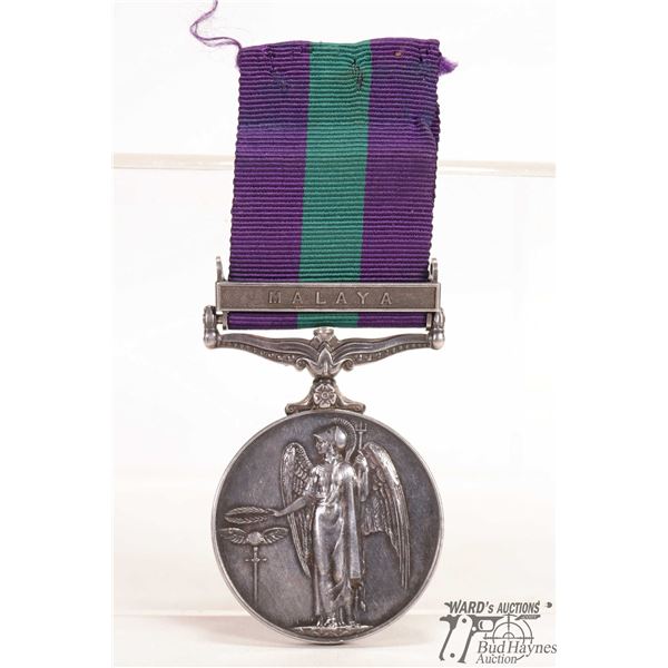 General Service medal 1918 - 1962 edge marked 22019444 PTE. I. M. Loudon. R.A.O.C. and has Malaya on