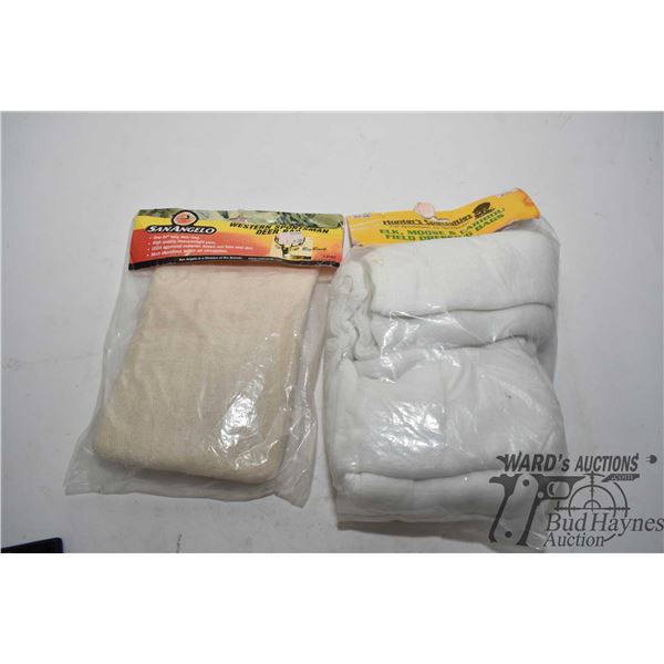 Inflatable buck decoy, two packs of filled dressing bags and a Primos The Great Big Can animal call.