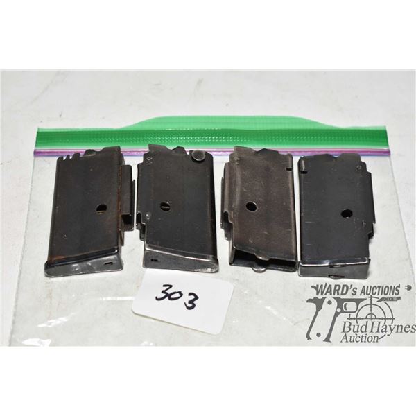 Three Mosseberg 340 series rifle mags in .22 LR plus one shell
