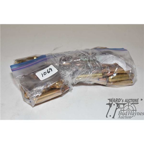 Bag w/ 52 rounds of 26 Nosler reloads and 10 brass