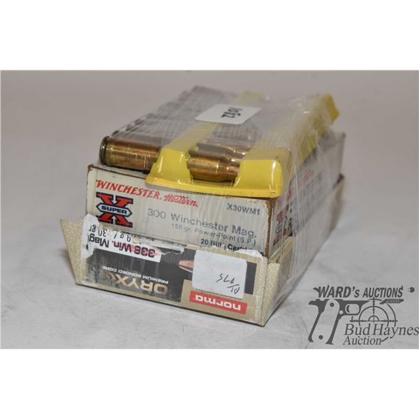 Two full 20 count boxes of .300 win mag reloads and 10 primed brass