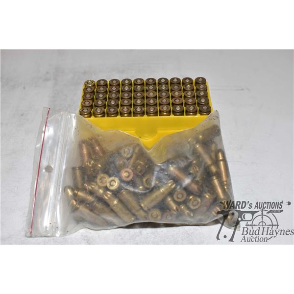 One 50 count box of 9mm reloads and a bag w/ 83 9mm blanks