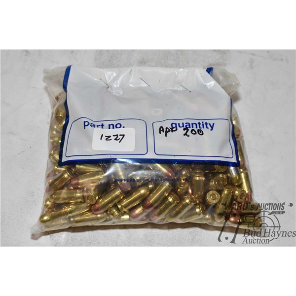 Bag w/ 200 rounds of .45 ACP reloads w/ jacketed round nose and hollow point and a factory box of 50