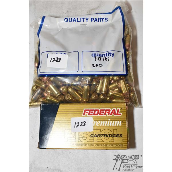 Bag w/ 200 rounds of .45 ACP reloads w/ jacketed round nose and hollow point and a factory box of 50