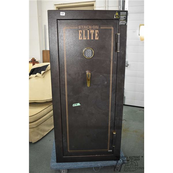Large elite heavy gauge steel combination safe measuring 59  H x 27  W x 23  D