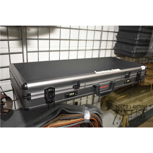 Winchester foam lined locking suitecase style gun case. Measures 31" L x 14 1/2" W x 4 1/2" D