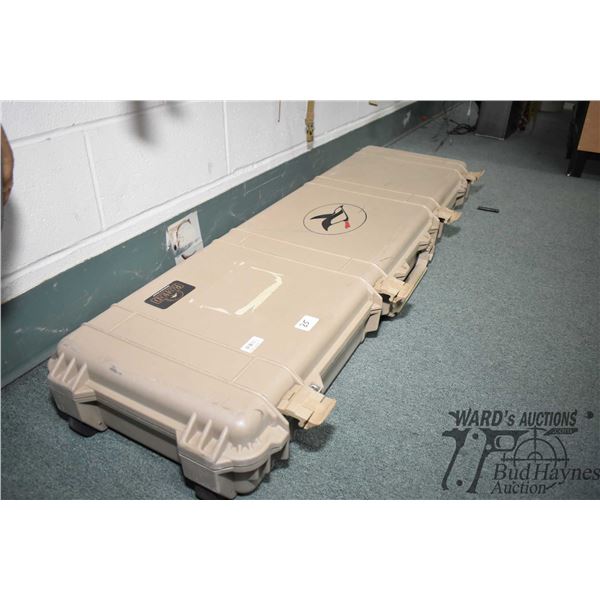 Redhead heavy duty hard plastic gun case w/ wheels and handle w/ fitted foam lining. Measures 52" L 