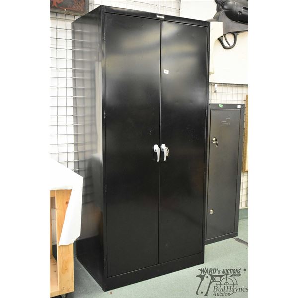 U-Line large metal storage bin w/ double locking doors and 6 adjustable shelves. Measures 78" H x 36