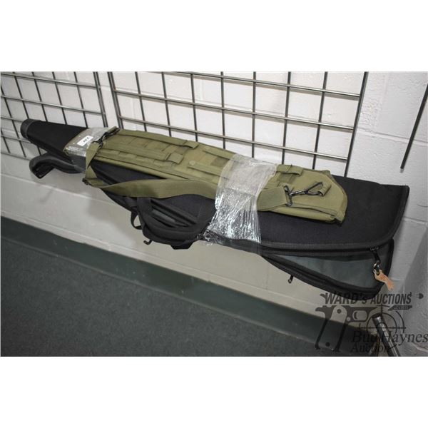 Two soft gun cases and a webbed riffle scabbard