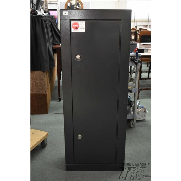 Metal eight gun locker w/ duel locks measuring 55" H x 21" W x 10" D