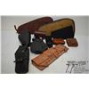 Image 1 : Two soft pistol cases, four leather ammp pouches, two leather holsters and one hard plastic holster
