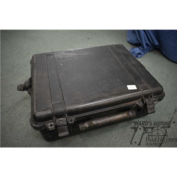 Heavy duty storage bin measuring 23" W x 19" L x 9" D. Plus three small hard handgun cases