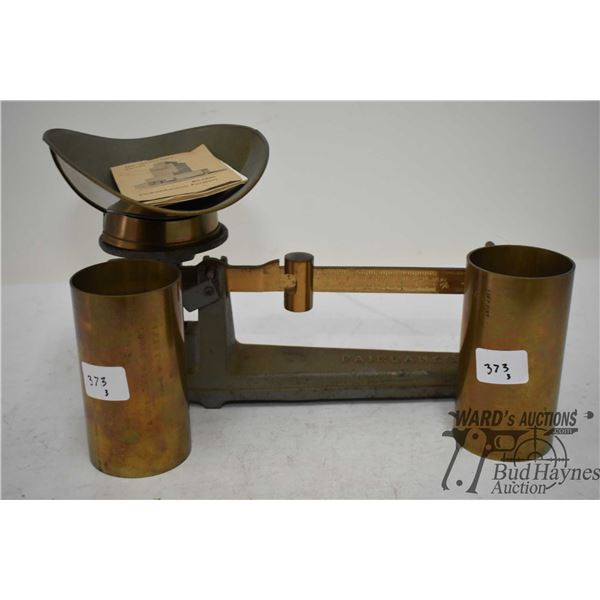 Vintage Fairbanks balance scale and two 1 pint brass cylinders