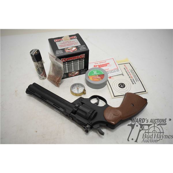 Crosman .177 cal .357 cal pistol, 17 powerlet cylinder, Marksman pellet trap and a 5 targer swing ac
