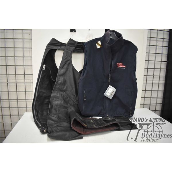 Two pairs of medium open chaps, one kidney belt and a cloth vest