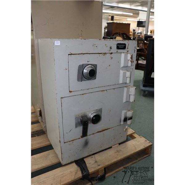 Heavy steel double door combination safe measuring 31" H x 21" W x 14" D