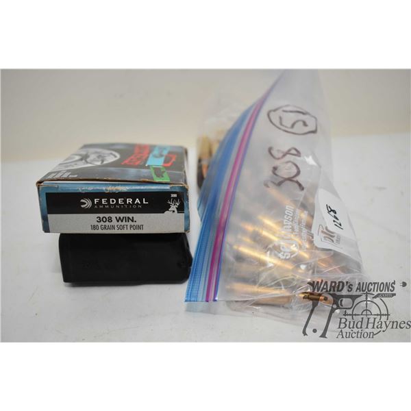 One bag w/ 51 .308 reloads and a box of .308 test reloads, plus a Browning .308 mag